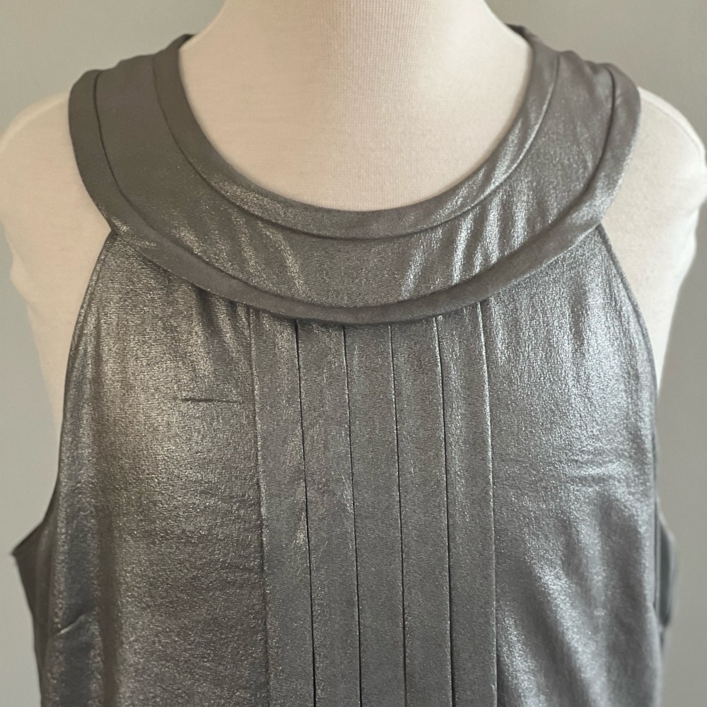 NWOT Banana Republic 100% silk tank. Silverish grey. No visible wear Dry cleaned